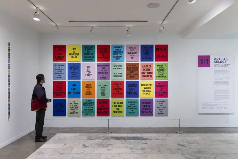 Installation view of Douglas Coupland's colourful slogan artworks in 1:1 Artists Select.