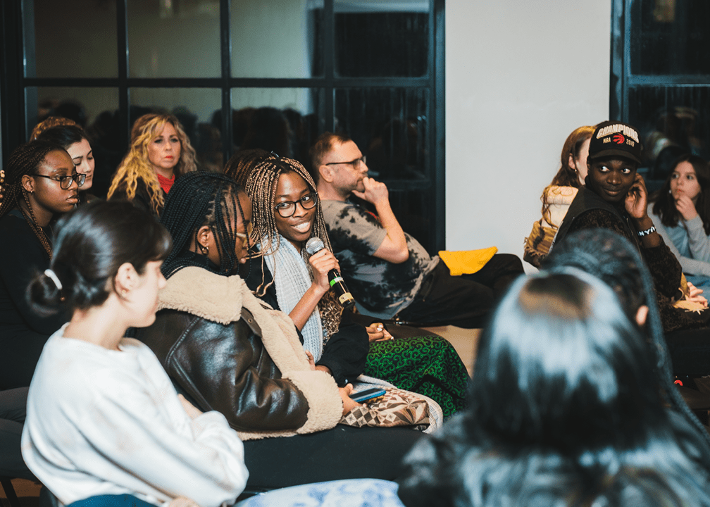 People participate in a talk