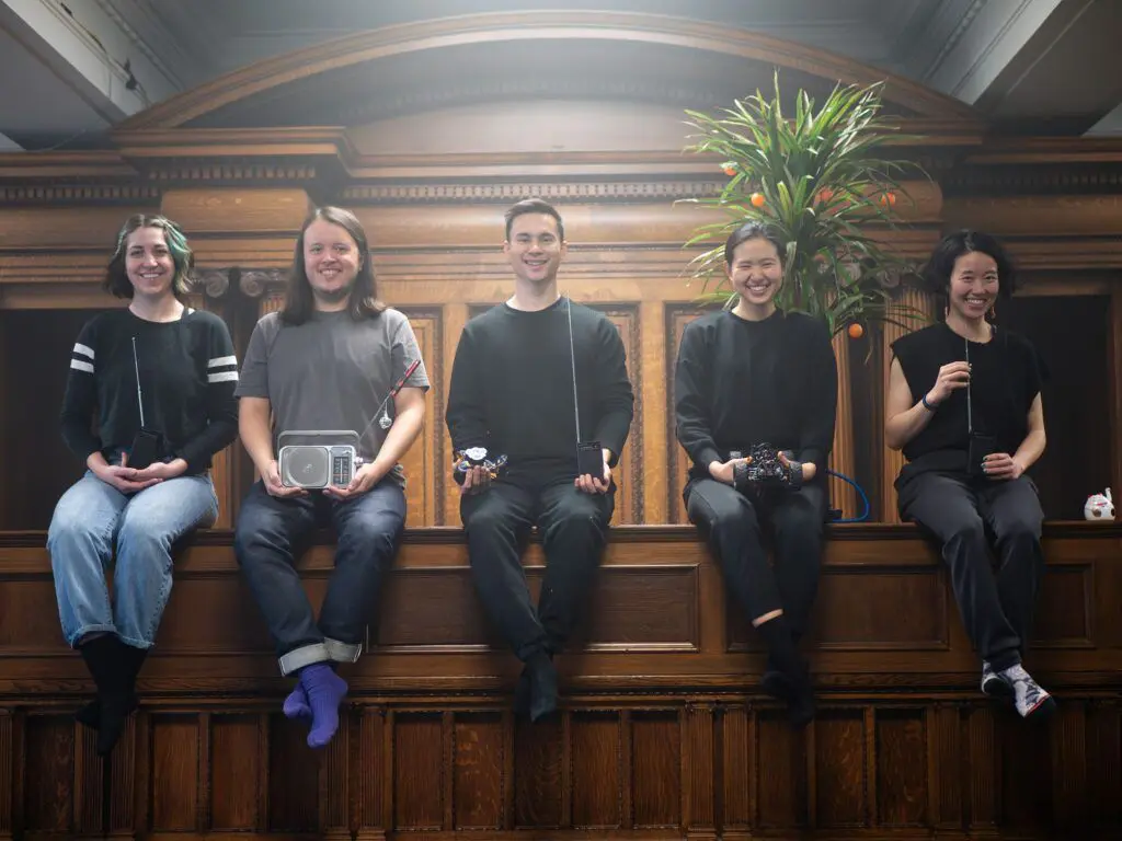 Hong Kong Exile group photo in Courtroom 302 at the Vancouver Art Gallery