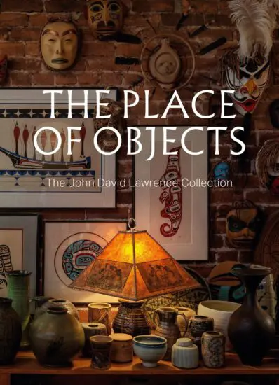 Cover for the catalogue The Place of Objects. Image is of a lit lamp in surrounded by ceramic and art objects